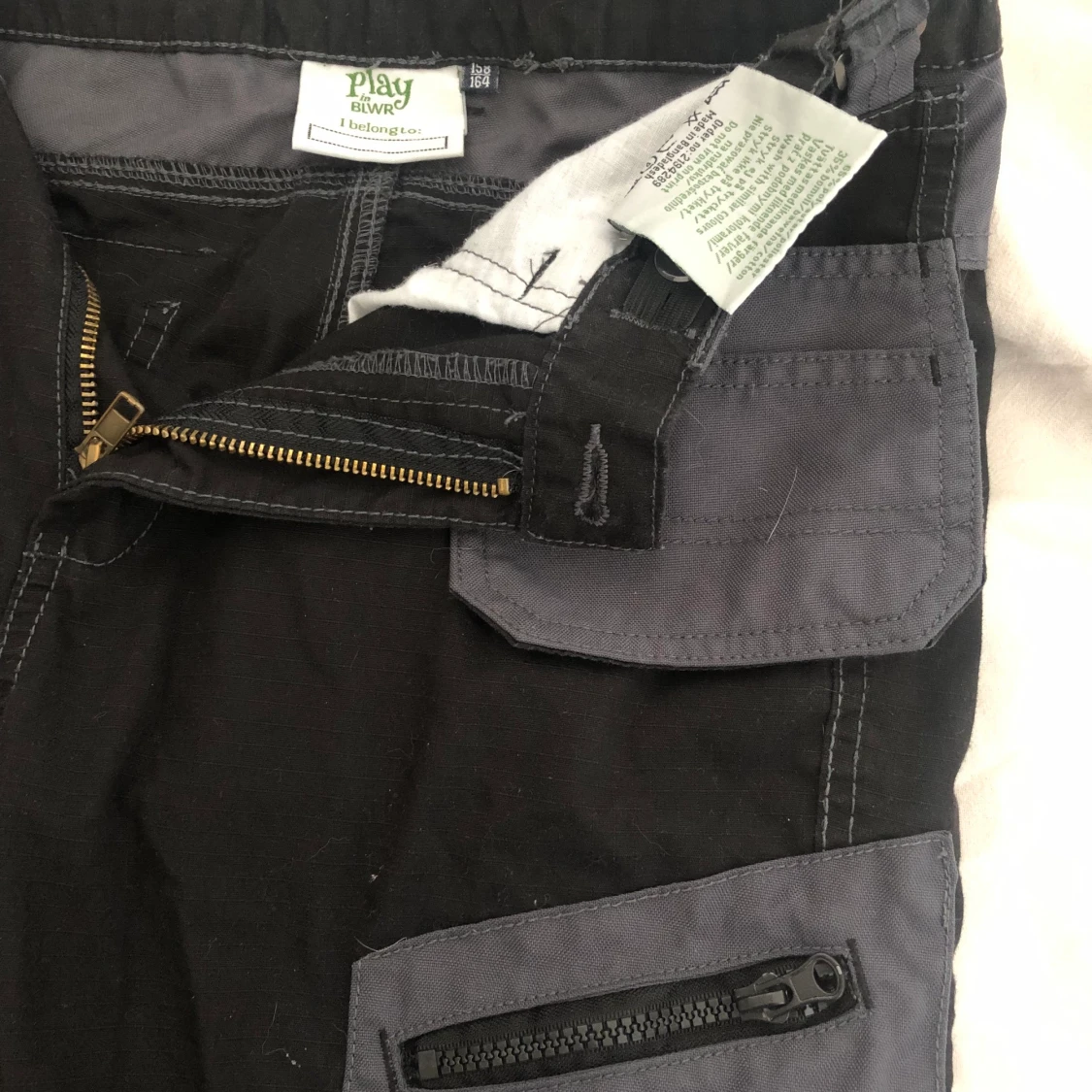 Grå och svarta varsel/ arbetsbyxor 