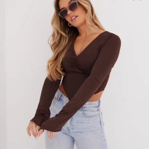 Topp - As snygg topp!! Aldrig använt då den inte va så smickrande på mig.