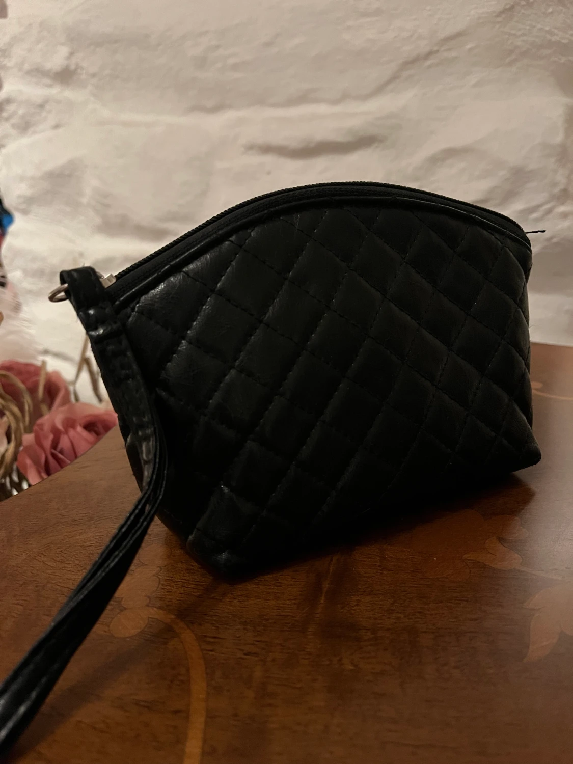 Svart handledsväska