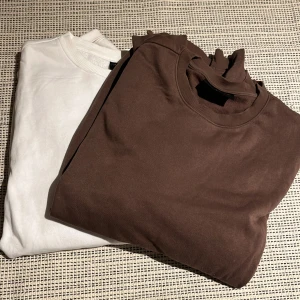 Oversized tröjor  - 2 tröjor från H&M, en vit i strl L och en brun i strl M