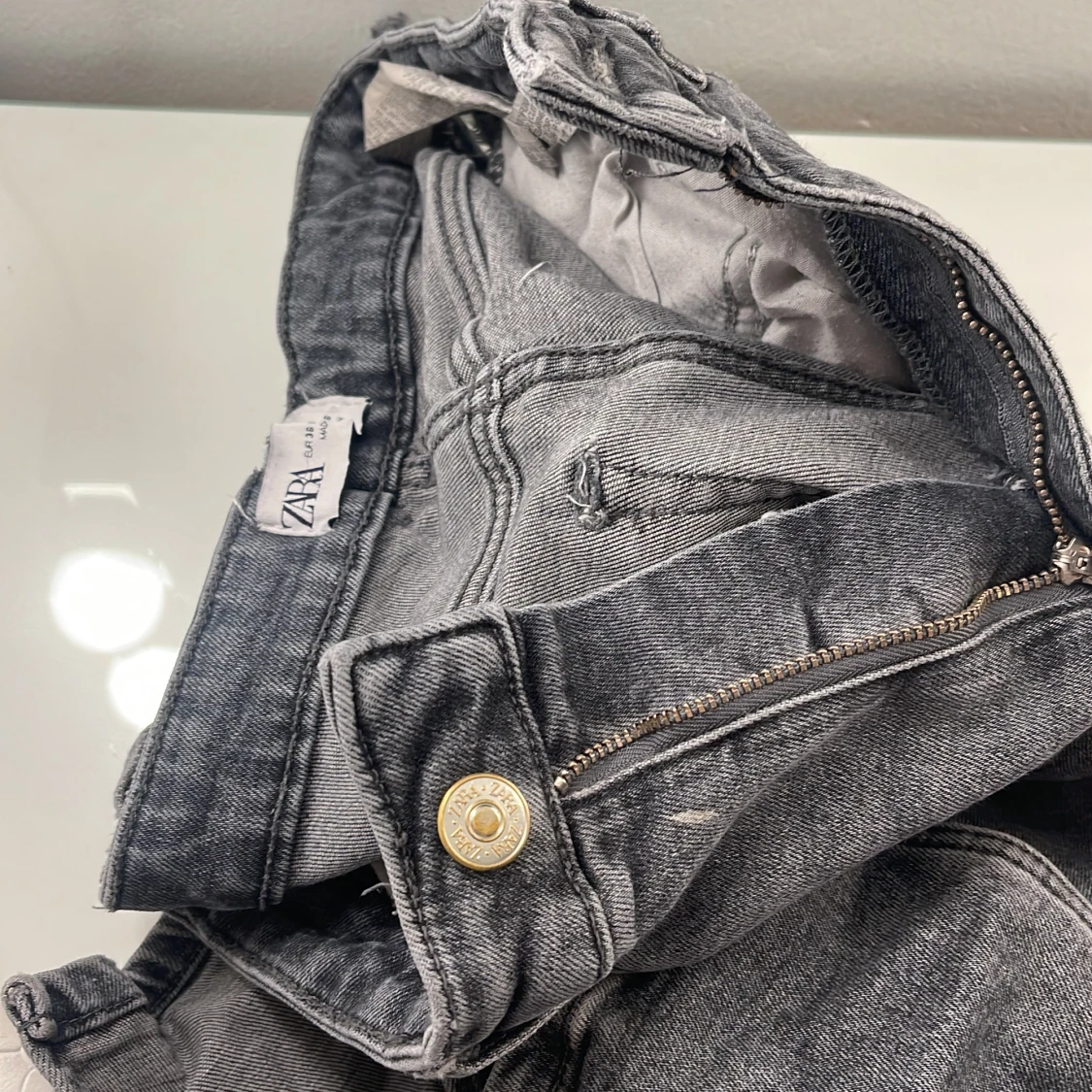 Gråa jeans slits - 90