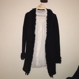  - Very nice wool Cardigan 
Used Two times and it's in good condition 
