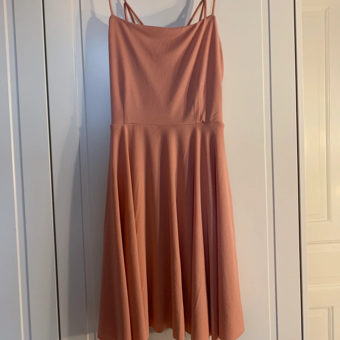 Ljus rosa/aprikos klänning  - 91