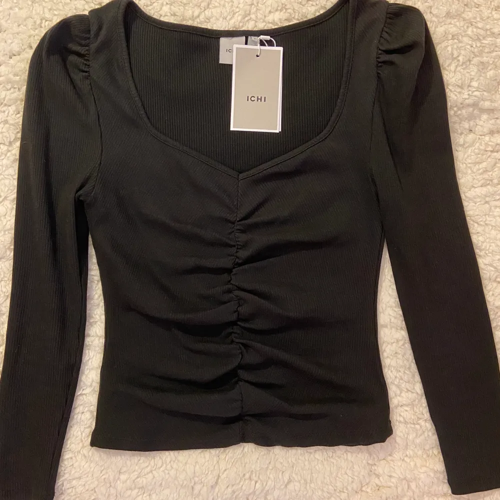 Completely new black blouse with label. Size S , ICHI. 92% cotton, 8% elastane. Made in Turkey . Blusar.
