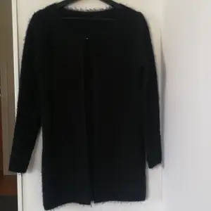 Medium size black cardigan 77cm long with long sleeves
