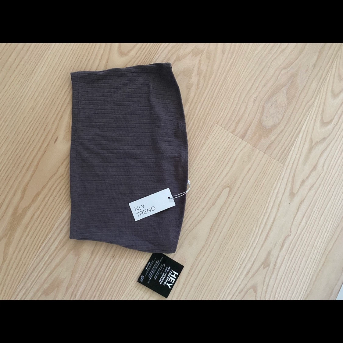 Oanvänd topp från nelly