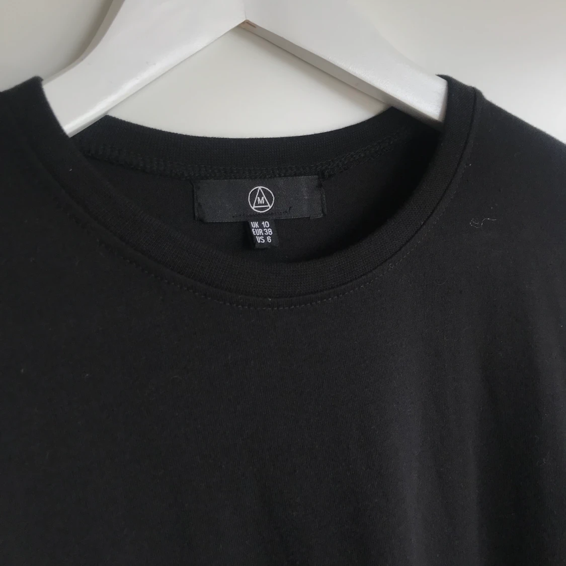 Svart t-shirtklänning  - 90