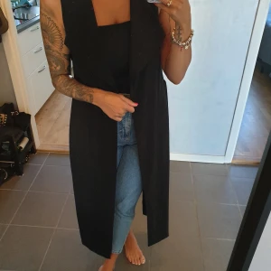 Long black gilet - Black long gilet from Miss Selfridges - slit in the back - size M-L