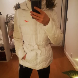 Hollister winter jacket.  - Bought 4 years ago. But condition still good. You can remove (fake) fur from the hood. Size is M. 
