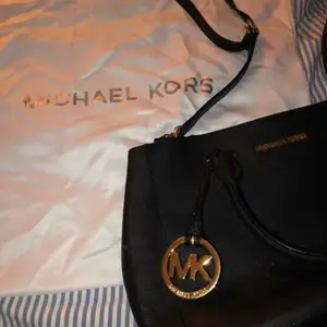 Michael Kors bag! Cute and casual :)) Slightly used, still in good condition. 