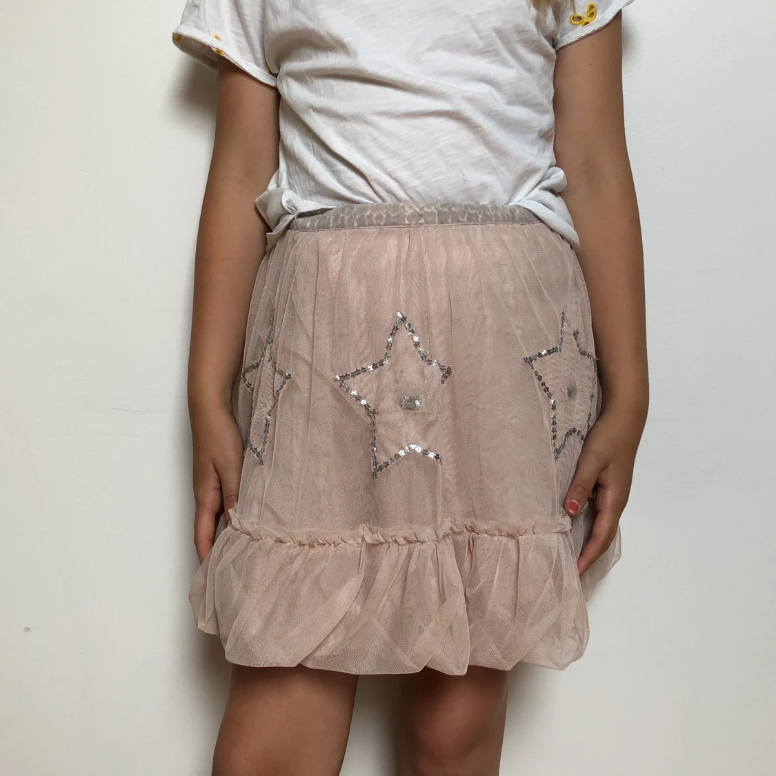 Rosa kjol med glittriga stjärnor 