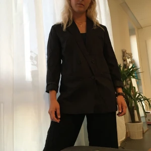  - Svart linnekavaj storlek 38