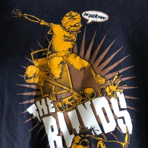  - The Blinds - bandtröja i bra använt skick. Något liten i modellen. Hämtas i Uppsala eller skickas mot fraktkostnad 