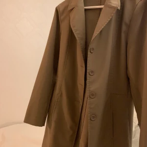 Kappa - Beige kappa, aldrig använd