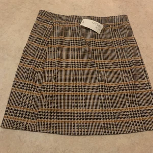 Kjol från Nelly  - Storlek M, ny 