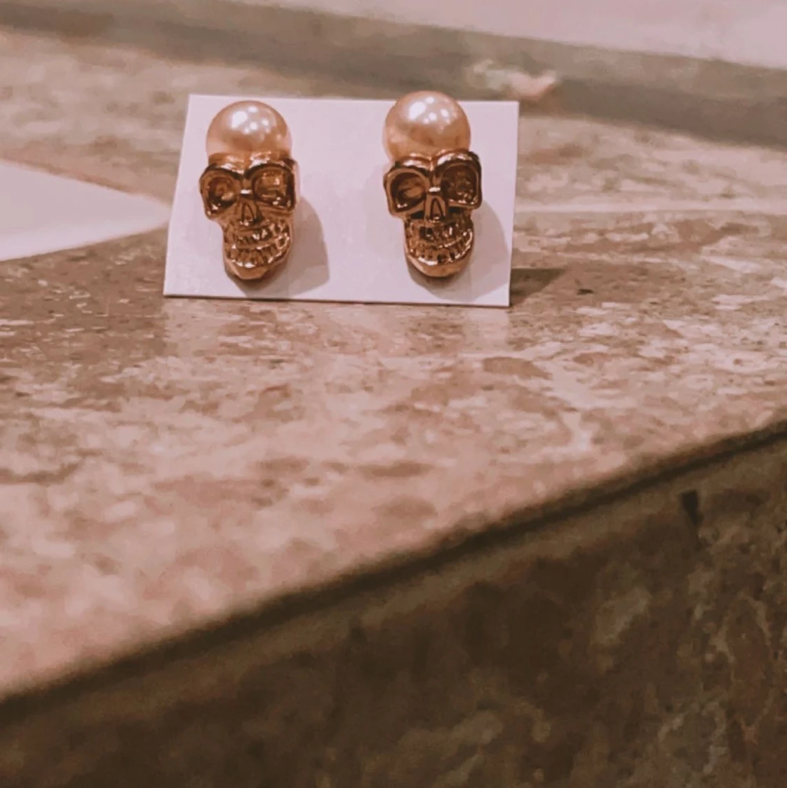 Skeleton gold earring 