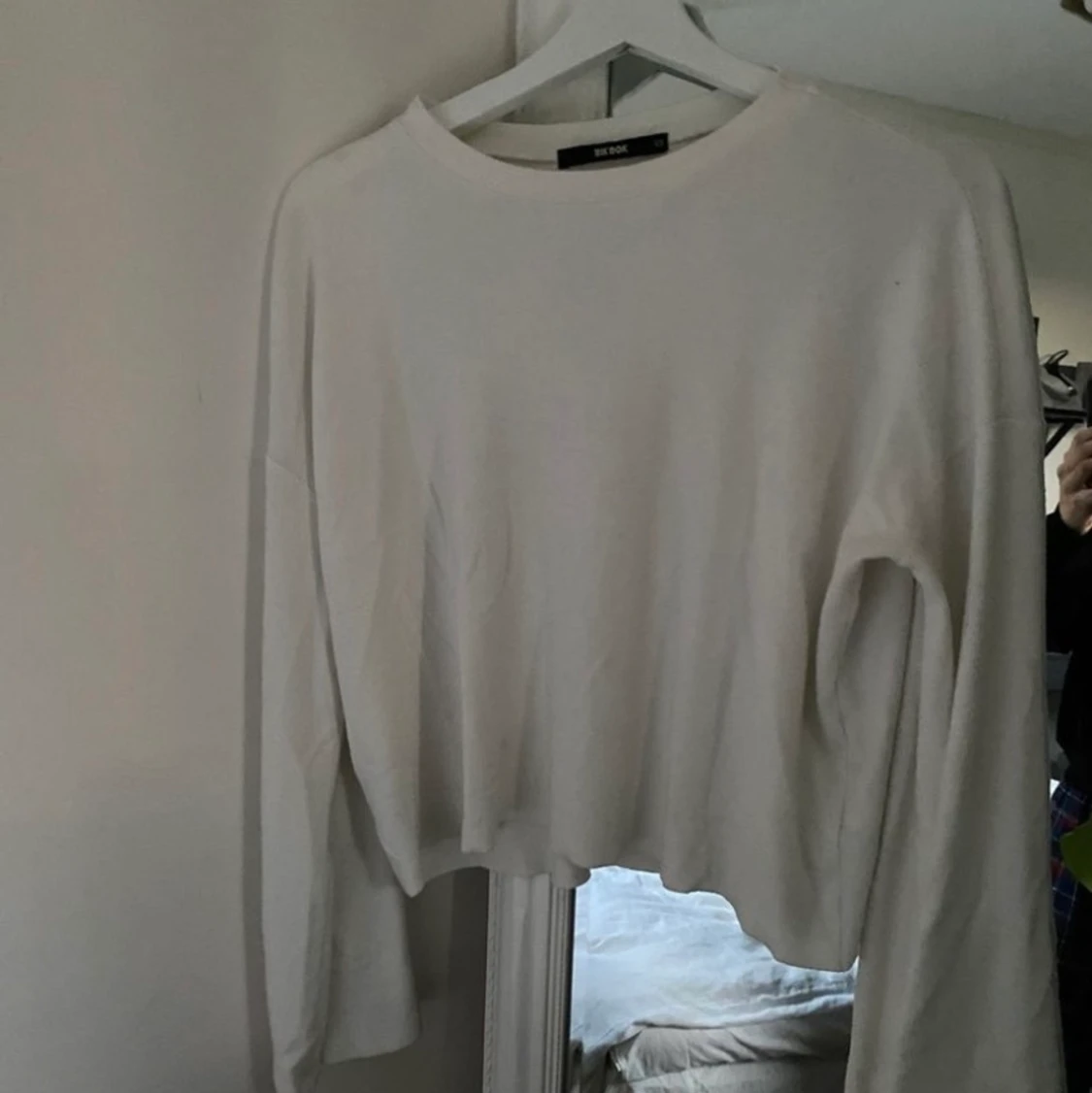 Tröja med vidaärmar