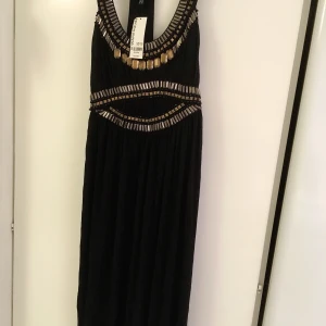 Klänning asos - Uk 10.Ny med prislappar.nypris över 800:-