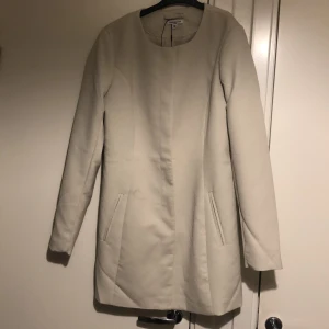 Kappa från Nelly  - Använd en gång behöver tvättas 