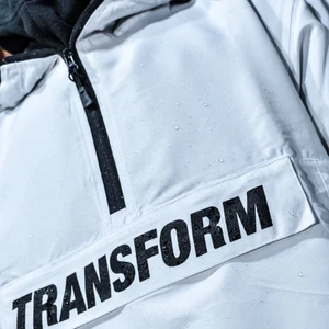 Snowboard Anorak - Transform Anorak/windbreaker. Brand new, from last season. Size L (unisex), white. Baggy fit.  Water resistant (10k). 