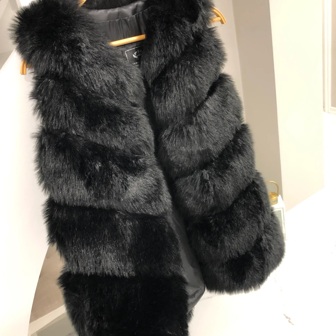 Oanvänd pälsväst - 90