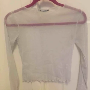  - Fin silverglittrig genomskinlig tröja från Brandy Melville 
