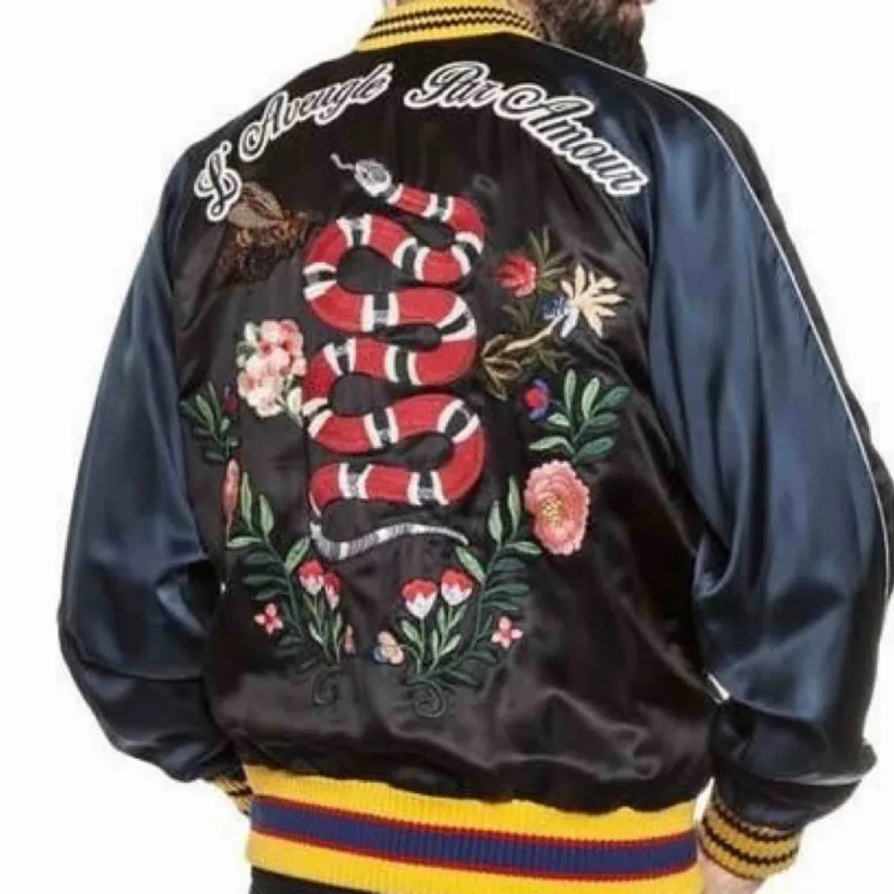 Men's black and multicolor Gucci floral-embroidered satin bomber jacket  Details Width: 45cm Shoulder: 16cm Length: 67cm Sleeve: 58cm  Country of Origin: Italy . Jackor.
