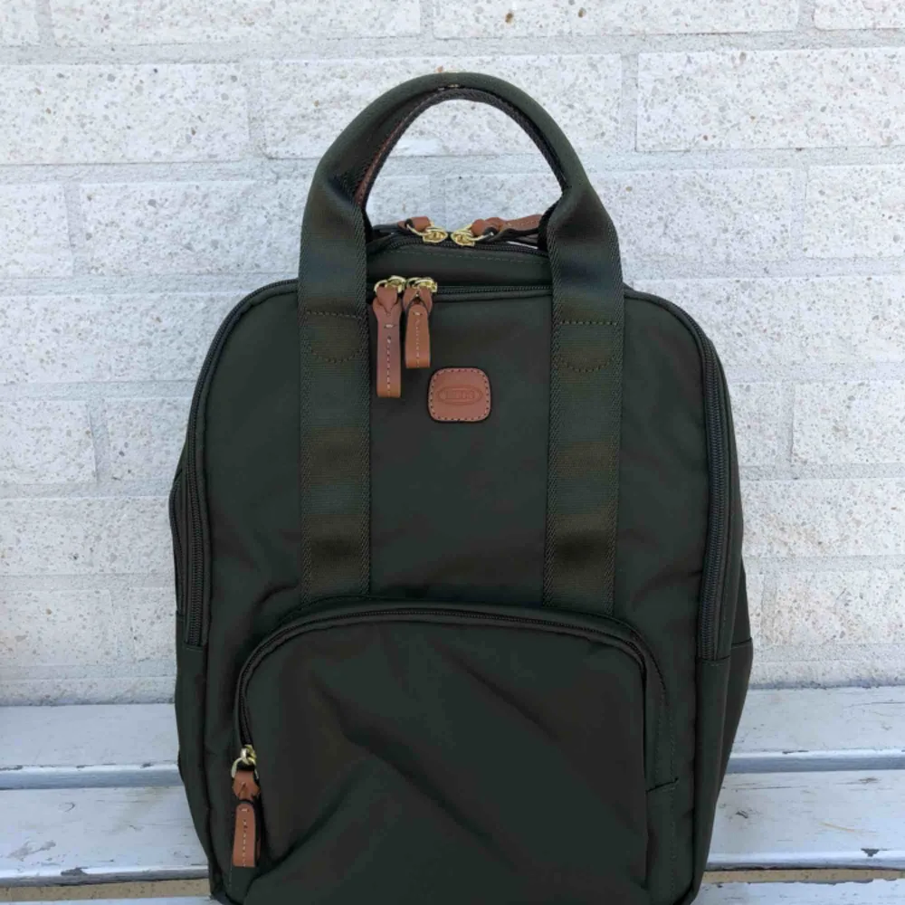 Helt ny väska från Briggs, mörkgrön färg, aldrig använd. Väskor.