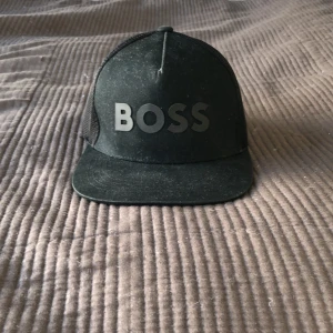 Hugo boss keps - Hugo boss keps, one size men töjbar. Pris kan diskuteras 