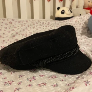 black hat - doesn’t really fit my head anymore since I got it around three years ago