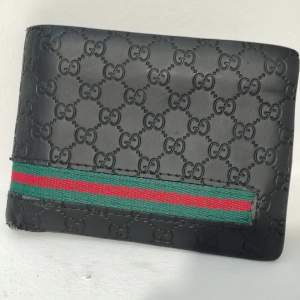 Använd Gucci wallet 