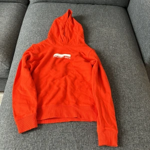 Orange hoodie - Bra skick har aldrig använt den