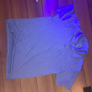 Piketröja - ljusblå piketröja