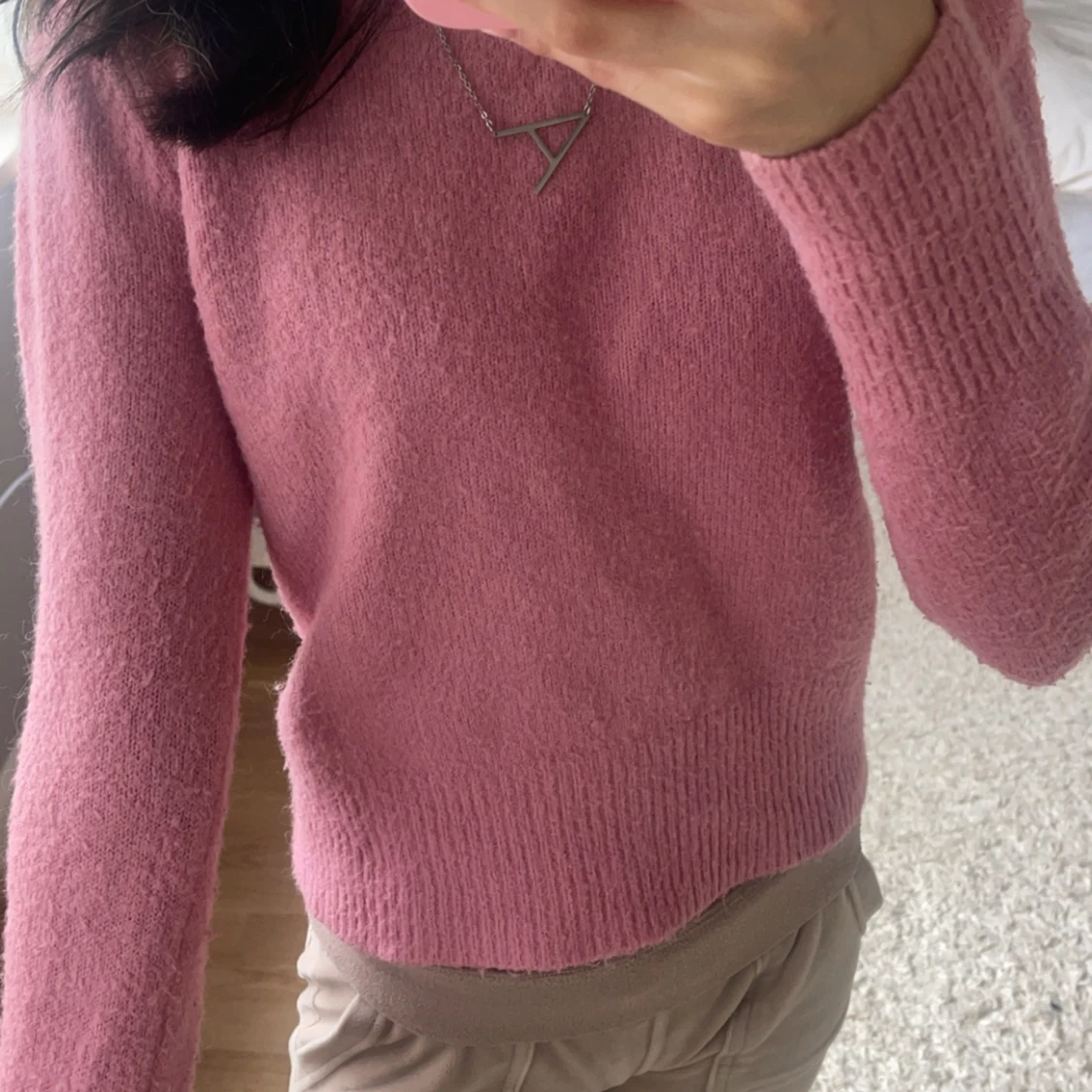 Rosa stickad tröja