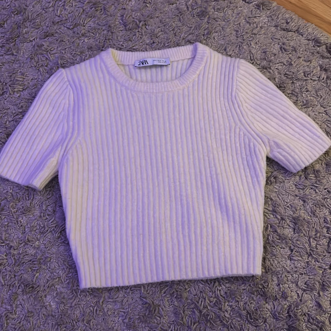 Kortärmad stickad tröja