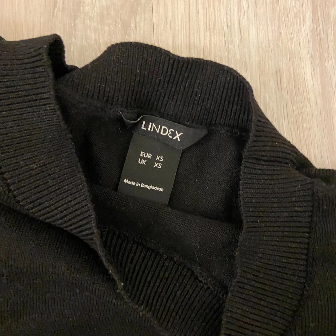 Svart stickad tröja