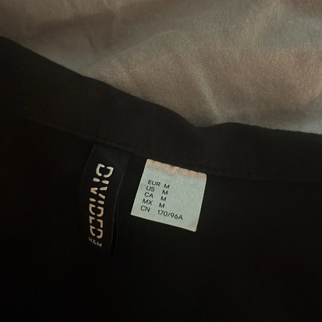 En liten kortärmad kofta - 90