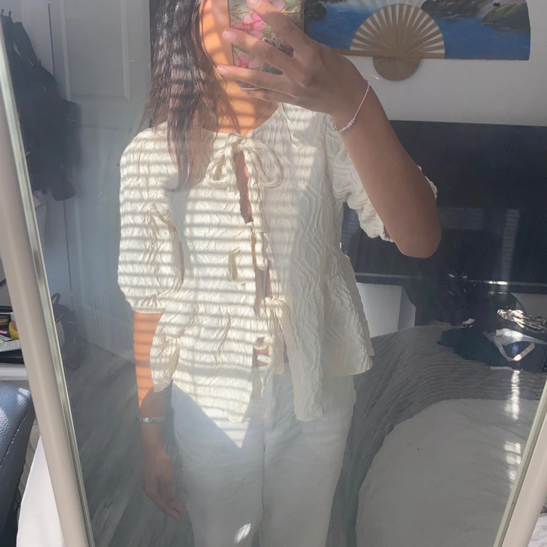 Blus med rosetter - 90