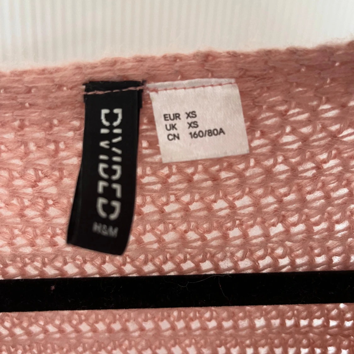 Rosa stickad tröja  - 91