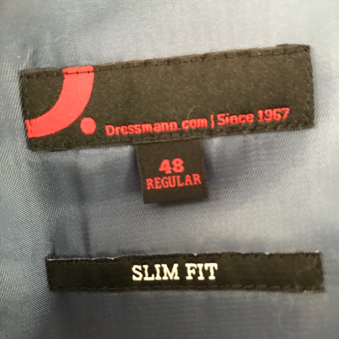 Mörkblå kostym med tillhörande byxor - 90