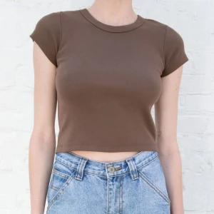Brun topp från Brandy Melville - Storlek: S/XS Skick: Väldigt bra  Priset kan diskuteras 🥰