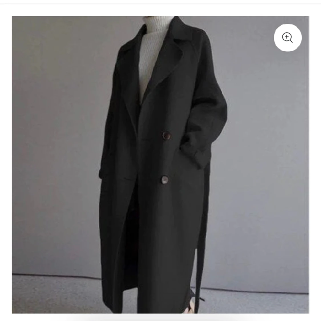 Svart ullkappa i storlek S