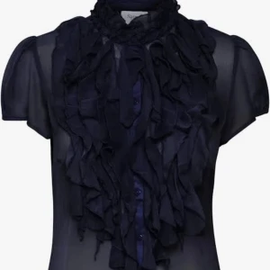 Blus - En super fin blus som sitter så fint. Den är lite genomskinlig vilket är super snyggt och där fram har den ett fint tyg mönster. Den är helt oanvänt. Ny utan prislapp 