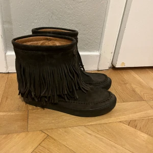 Odd molly Minnetonka - Storlek 37, har haft dom länge men är sparsamt använda. Hela och rena