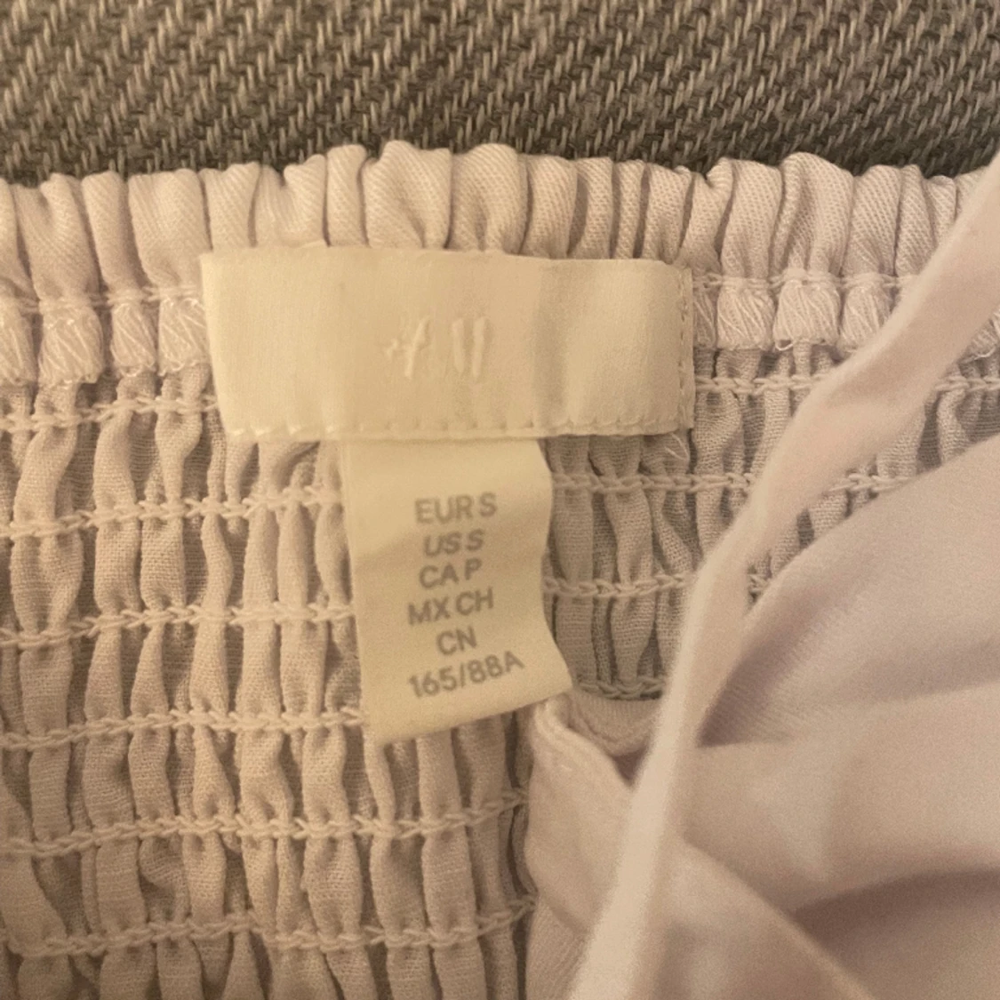 Topp med detalj - 90