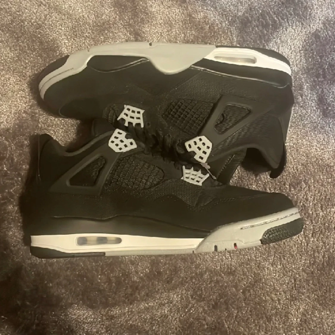 Jordan 4 black canvas 