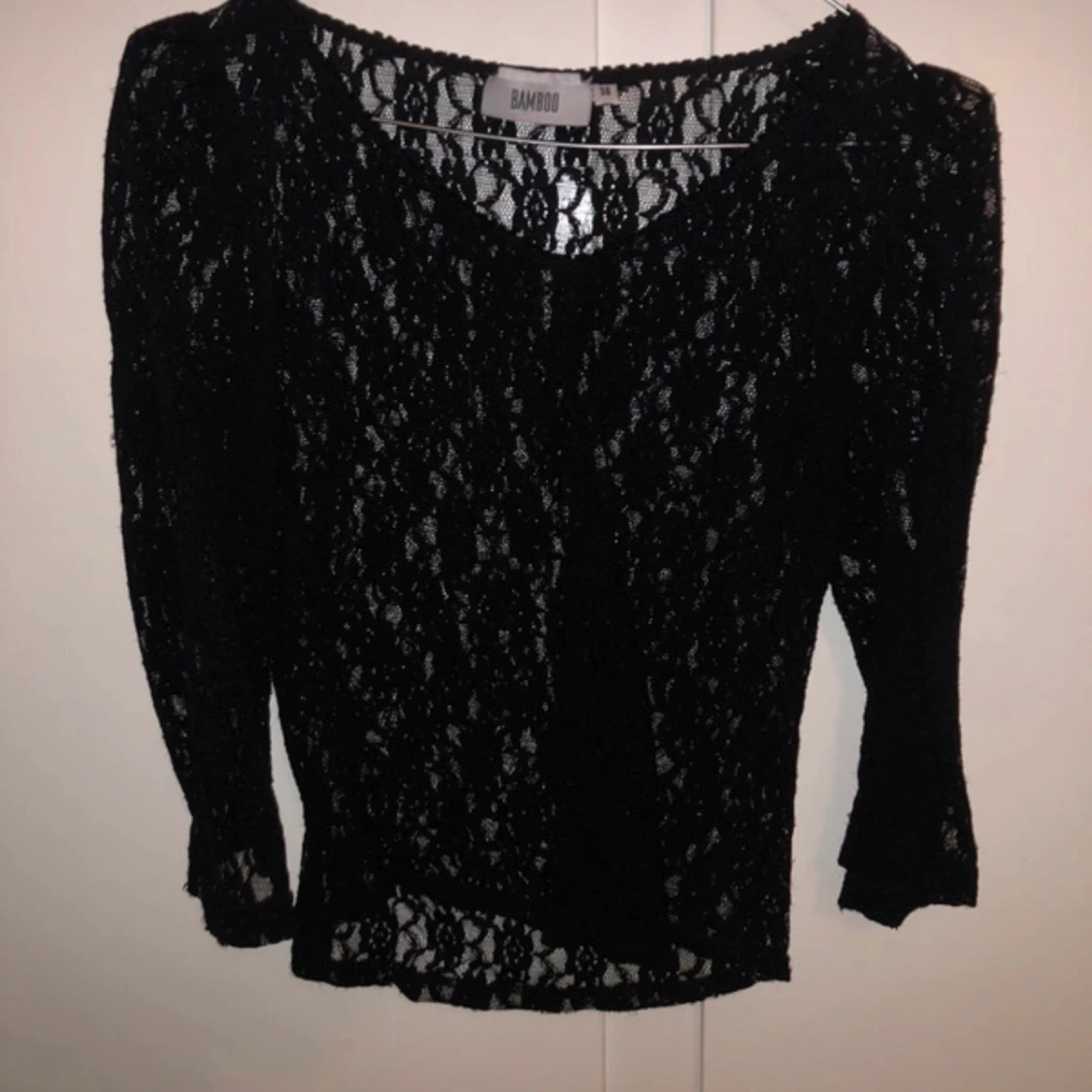 Svart spetströja med trekvartsärm - 90