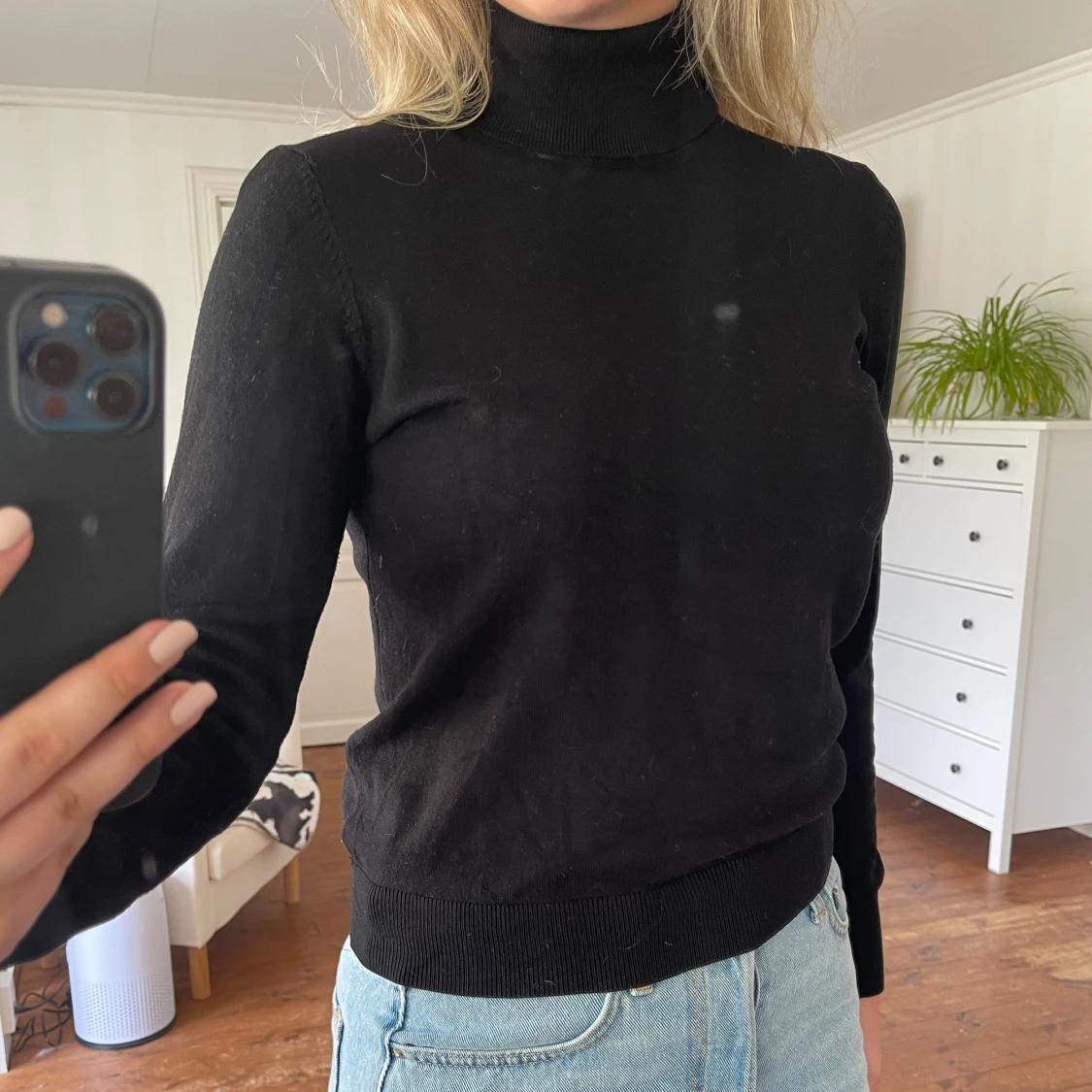 Svart turtleneck tröja