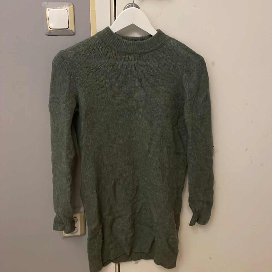 Grön stickad klänning