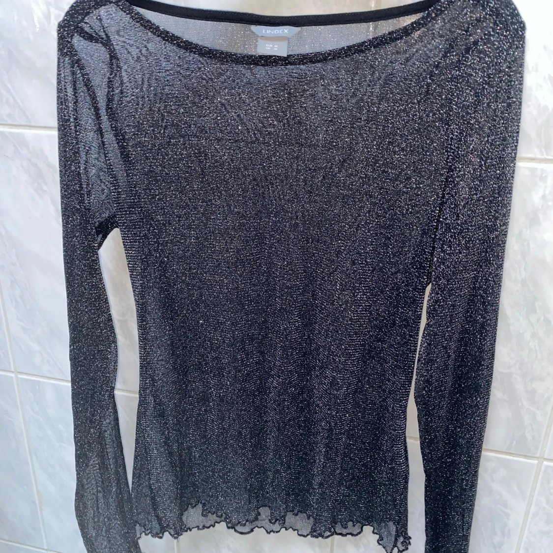 Glittrig tröja  - 93